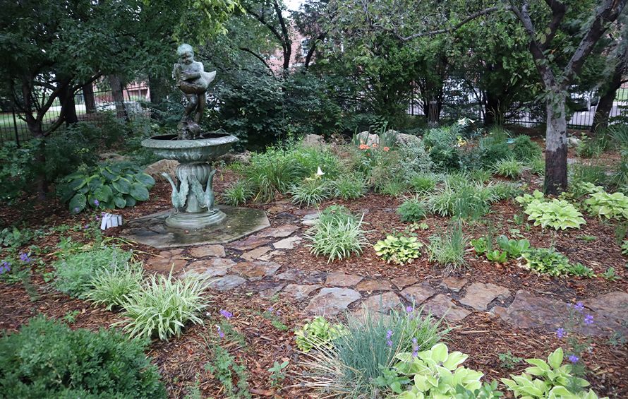 Shade garden with rock and fountain